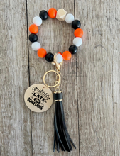 Load image into Gallery viewer, Orange Black and White Wristlet
